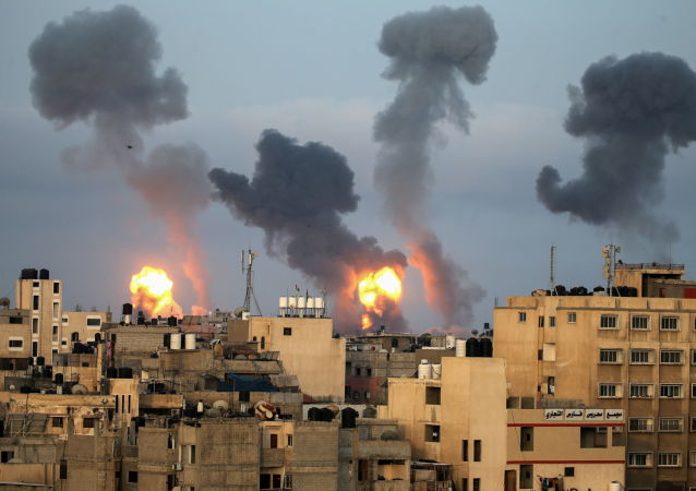 以色列空袭加沙地带造成的死�o我�L�_亡人数增至22人