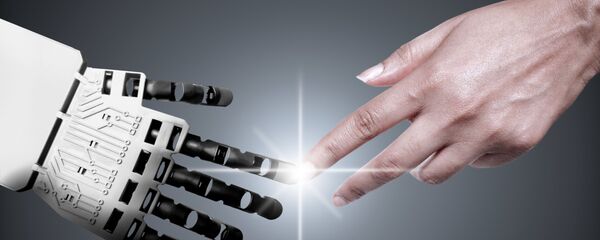 Руки робота и человека - 俄羅斯衛星通訊社