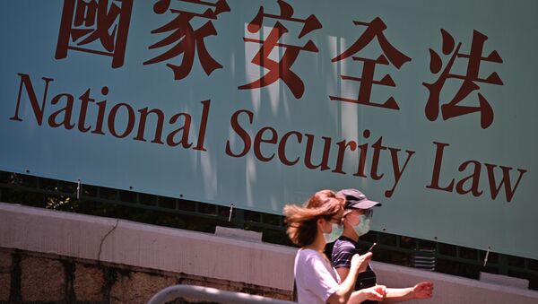 Баннер с надписью Закон национальной безопасности. Гонконг Китай - 俄罗斯卫星通讯社