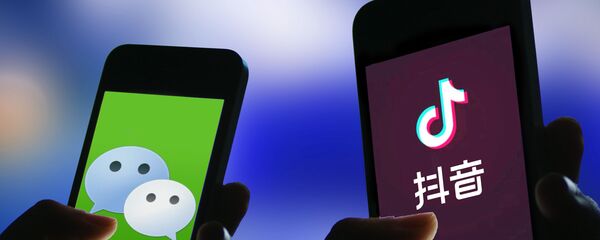 Мобильные приложения WeChat и Tik Tok на экране смартфонов Мобильные приложения WeChat и Tik Tok на экране смартфонов - 俄羅斯衛星通訊社