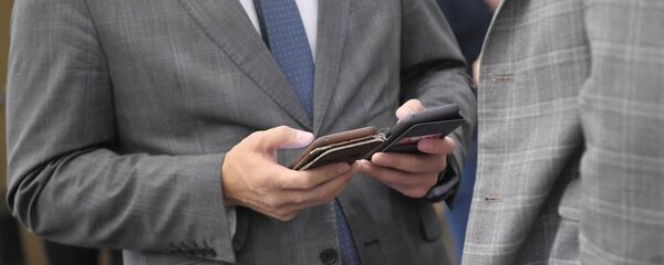  Посетитель выставки в рамках XII Недели российского интернета - 俄罗斯卫星通讯社