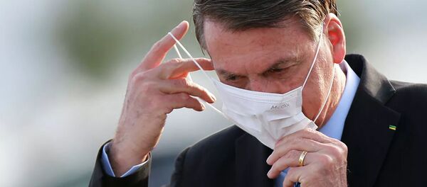 Президент Бразилии Жаир Болсонару в защитной маске - 俄罗斯卫星通讯社