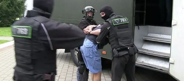 Кадр оперативного видео задержания предположительно 32 членов частной военной компании в Белоруссии - 俄羅斯衛星通訊社