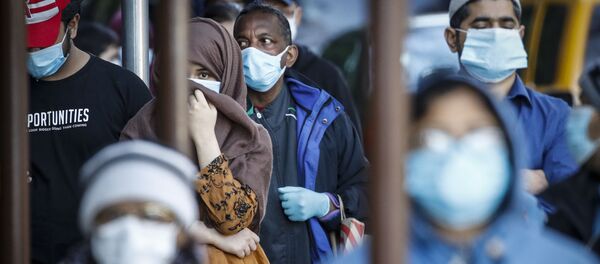 Люди с масках для защиты от коронавируса, США - 俄羅斯衛星通訊社