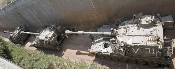 Самоходные гаубицы израильской армии на границе с Ливаном Самоходные гаубицы израильской армии на границе с Ливаном - 俄罗斯卫星通讯社