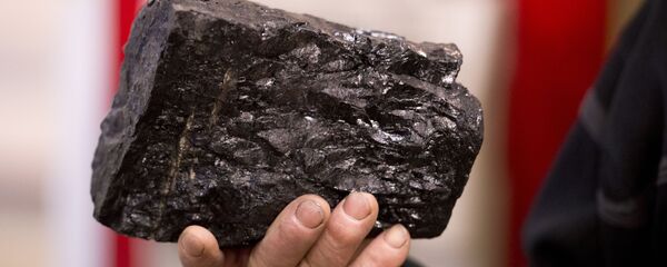 Уголь в руках английского шахтера  - 俄罗斯卫星通讯社