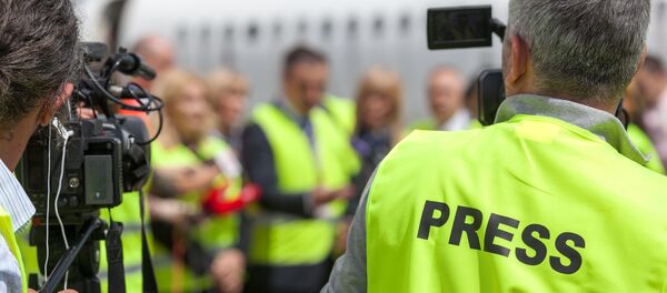 Журналисты за работой - 俄罗斯卫星通讯社