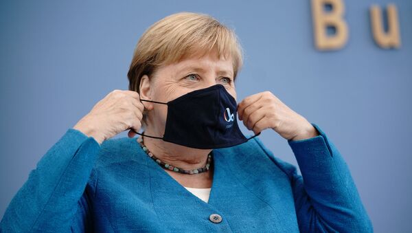 Канцлер Германии Ангела Меркель на пресс-конференции по коронавирусу в Берлине. - 俄羅斯衛星通訊社