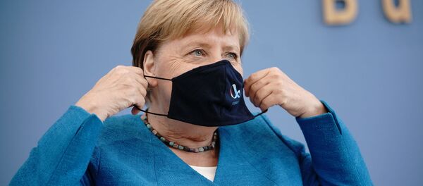 Канцлер Германии Ангела Меркель на пресс-конференции по коронавирусу в Берлине. Канцлер Германии Ангела Меркель на пресс-конференции по коронавирусу в Берлине. - 俄羅斯衛星通訊社