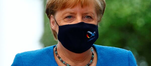 Канцлер Германии Ангела Меркель на пресс-конференции по коронавирусу в Берлине. Канцлер Германии Ангела Меркель на пресс-конференции по коронавирусу в Берлине. - 俄罗斯卫星通讯社