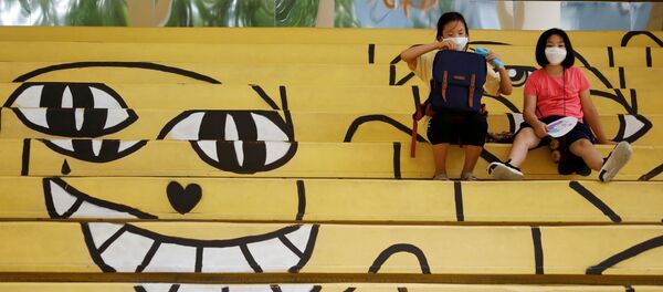 Южнокорейские студенты в защитных масках - 俄罗斯卫星通讯社