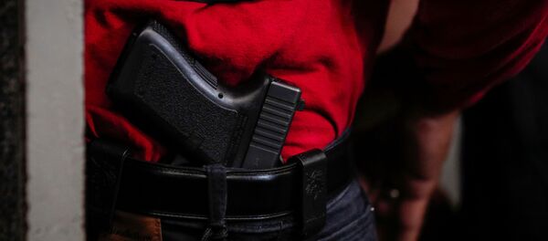 Ношение оружия - 俄羅斯衛星通訊社
