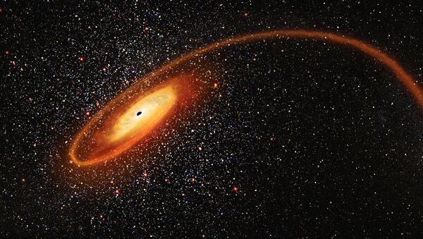 Иллюстрация, изображающая поглощение звезды черной дырой - 俄罗斯卫星通讯社