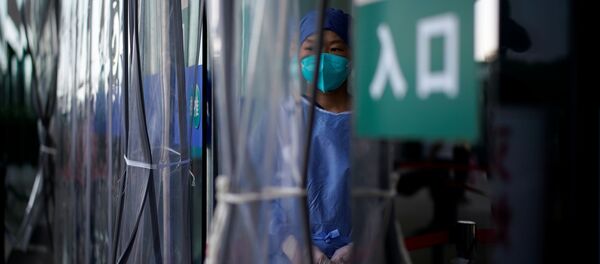 Медицинский сотрудник в маске. Ухань - 俄羅斯衛星通訊社