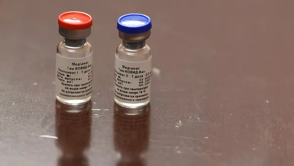 Первая в мире зарегистрированная вакцина от коронавируса COVID-19 Спутник V - 俄羅斯衛星通訊社