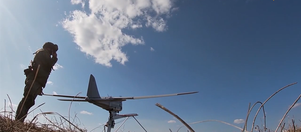 俄摩托化步兵演習過程中無人機編隊與炮兵相互配合 俄摩托化步兵演習過程中無人機編隊與炮兵相互配合 - 俄羅斯衛星通訊社