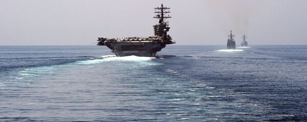 Американский атомный авианосец Нимиц (CVN 68), ракетный крейсер Принстон (CG 59) и эсминец Стеретт (DDG-104) в Ормузском проливе Американский атомный авианосец Нимиц (CVN 68), ракетный крейсер Принстон (CG 59) и эсминец Стеретт (DDG-104) в Ормузском проливе - 俄罗斯卫星通讯社