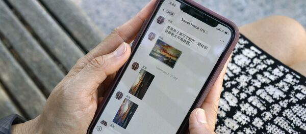 Открытое приложение WeChat в смартфоне - 俄罗斯卫星通讯社