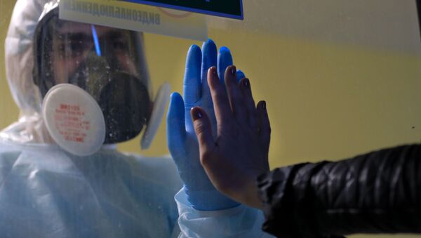 Медицинский работник в стационаре для больных с коронавирусной инфекцией - 俄羅斯衛星通訊社