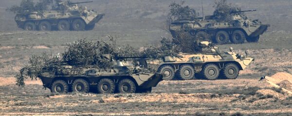 Бронетранспортёры БТР-82А во время командно-штабных учений Кавказ-2020 на полигоне Турали в республике Дагестан. - 俄罗斯卫星通讯社