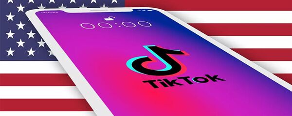 Приложение TikTok на фоне американского флага Приложение TikTok на фоне американского флага - 俄羅斯衛星通訊社