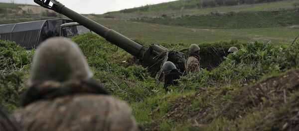 Артиллерийская позиция в районе села Мадагис в зоне карабахского конфликта. Артиллерийская позиция в районе села Мадагис в зоне карабахского конфликта. - 俄罗斯卫星通讯社