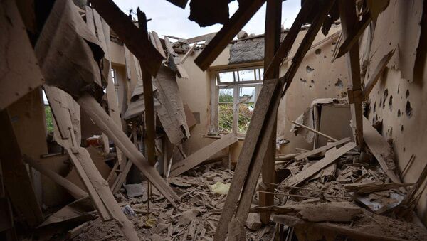 Дом, разрушенный после обстрела азербайджанскими войсками города Мартуни в Карабахе - 俄罗斯卫星通讯社