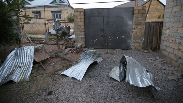 Дом, поврежденный во время обстрелов в городе Тертер - 俄羅斯衛星通訊社