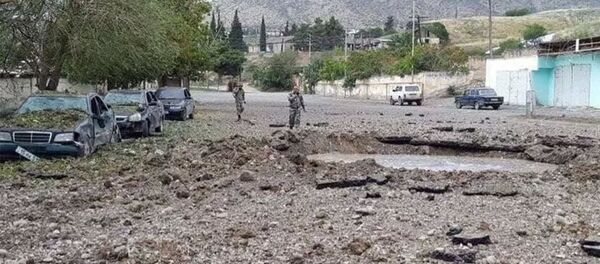 Разрушения в результате азербайджанской бомбардировки в городе Мартакерт Разрушения в результате азербайджанской бомбардировки в городе Мартакерт - 俄罗斯卫星通讯社
