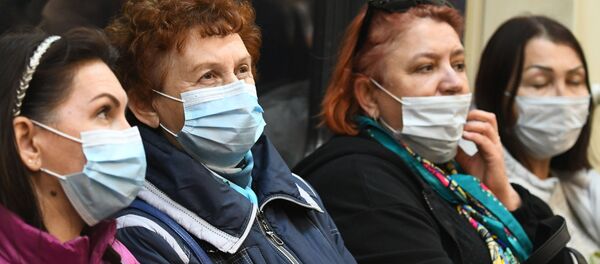  Пассажиры в вагоне Московского метрополитена - 俄罗斯卫星通讯社