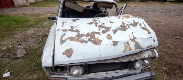 Поврежденный автомобиль в результате обстрелов общины Иванян Нагорного Карабаха Поврежденный автомобиль в результате обстрелов общины Иванян Нагорного Карабаха - 俄羅斯衛星通訊社