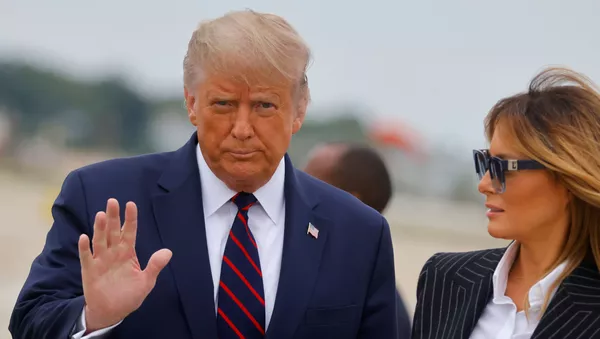 Президент США Дональд Трамп с Меланьей Трамп - 俄羅斯衛星通訊社