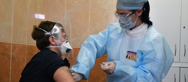 Вакцинация добровольцев российским препаратом от коронавируса Спутник V в Белоруссии Вакцинация добровольцев российским препаратом от коронавируса Спутник V в Белоруссии - 俄罗斯卫星通讯社