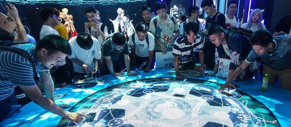 Посетители  China Digital Entertainment Expo and Conference - 俄罗斯卫星通讯社