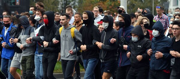  Участники несанкционированной акции протеста оппозиции в Минске. - 俄羅斯衛星通訊社