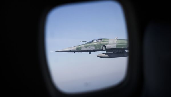 据媒体报道，伊朗一架F-5战斗机的弹射系统在起飞前启动，两名飞行员丧生 - 俄罗斯卫星通讯社