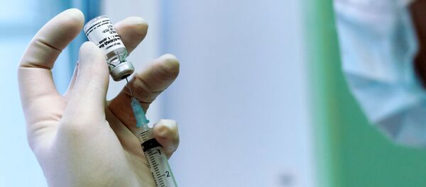 Медсестра во время вакцинации сотрудников Городской клинической инфекционной больницы имени С. П. Боткина от коронавирусной инфекции вакциной Гам-Ковид-Вак Медсестра во время вакцинации сотрудников Городской клинической инфекционной больницы имени С. П. Боткина от коронавирусной инфекции вакциной Гам-Ковид-Вак - 俄羅斯衛星通訊社