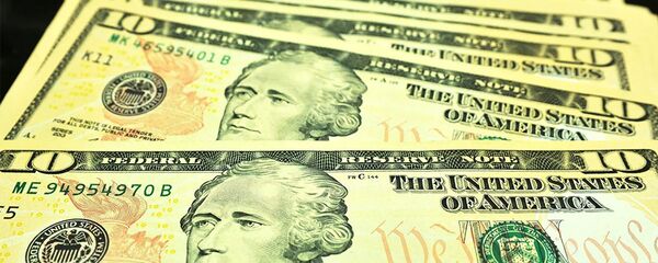 Купюры номиналом 10 долларов США Купюры номиналом 10 долларов США - 俄罗斯卫星通讯社