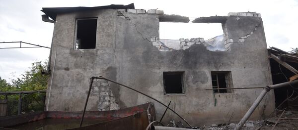 Дом в Мартакерте, разрушенный в результате обстрелов. Дом в Мартакерте, разрушенный в результате обстрелов. - 俄羅斯衛星通訊社