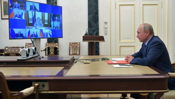 Президент РФ Владимир Путин проводит оперативное совещание с постоянными членами Совета безопасности РФ в режиме видеоконференции. - 俄罗斯卫星通讯社