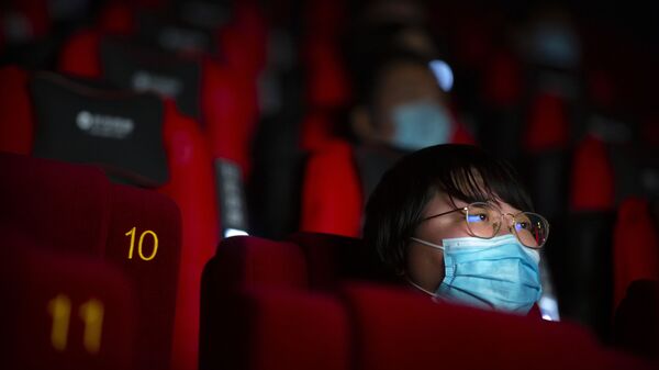Женщина в кинотеатре. Китай - 俄羅斯衛星通訊社