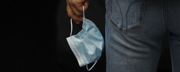 Женщина с медицинской маской. Пекин - 俄羅斯衛星通訊社