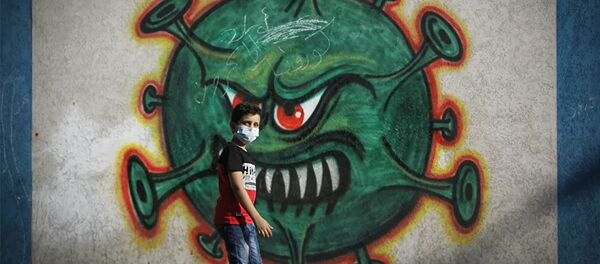 Ребенок на фоне граффити с коронавирусом Ребенок на фоне граффити с коронавирусом - 俄罗斯卫星通讯社