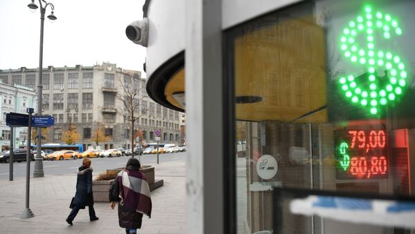 Электронное табло со знаком доллар на одной из улиц в Москве - 俄羅斯衛星通訊社