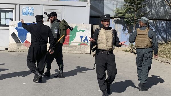 Афганские полицейские на месте атаки на университет в Кабуле - 俄罗斯卫星通讯社