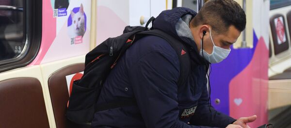 Пассажир в вагоне метро - 俄罗斯卫星通讯社