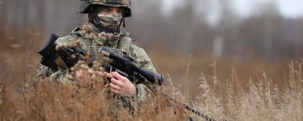 Снайпер спецназа ЦВО во время тактического учения на одном из полигонов Сибири Снайпер спецназа ЦВО во время тактического учения на одном из полигонов Сибири - 俄罗斯卫星通讯社