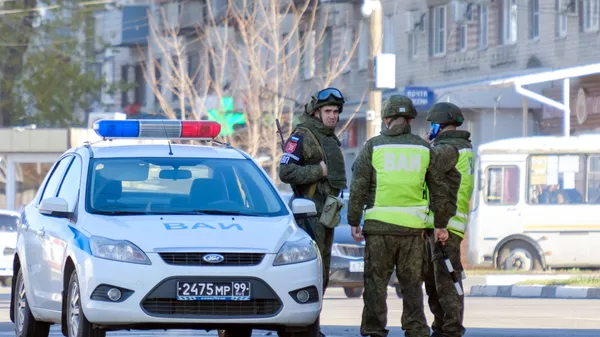 Патруль военной полиции и сотрудники военной автомобильной инспекции на окраине Воронежа.  - 俄羅斯衛星通訊社