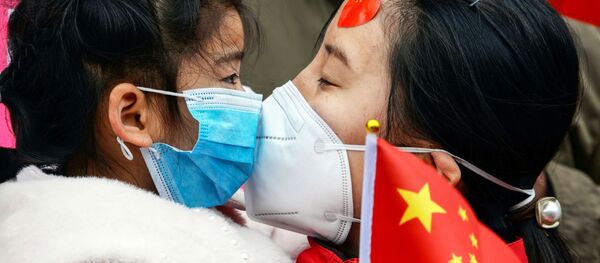 Женщина с девочкой Женщина с девочкой - 俄羅斯衛星通訊社