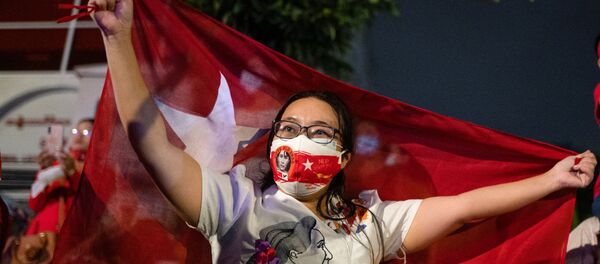 Сторонники Аун Сан Су Чжи во время выборов в Мьянме. 9 ноября 2020 Сторонники Аун Сан Су Чжи во время выборов в Мьянме. 9 ноября 2020 - 俄罗斯卫星通讯社